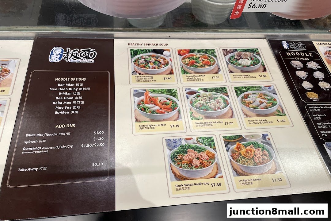 A menu display for Food Junction featuring various noodle dishes and add-ons.