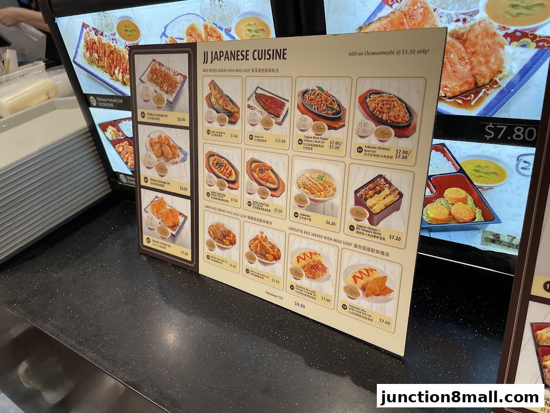 A menu board displaying various Japanese cuisine dishes with prices and images.