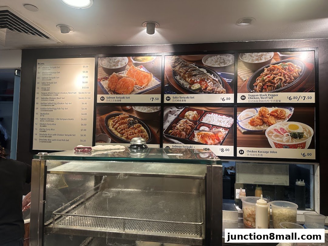 A menu board displaying various Japanese food sets with images and prices.