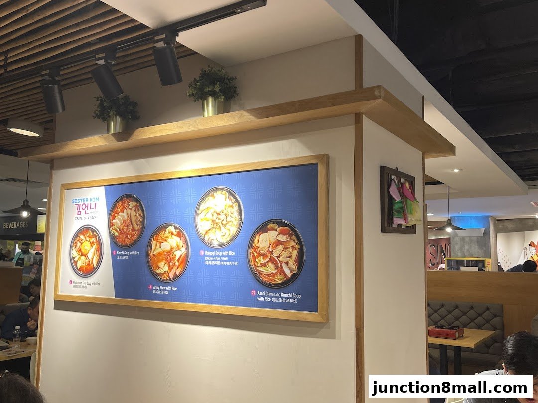A menu board displaying various Korean soups with images and descriptions.