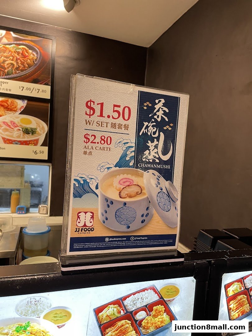 A menu board advertising Chawanmushi with set and a la carte pricing.