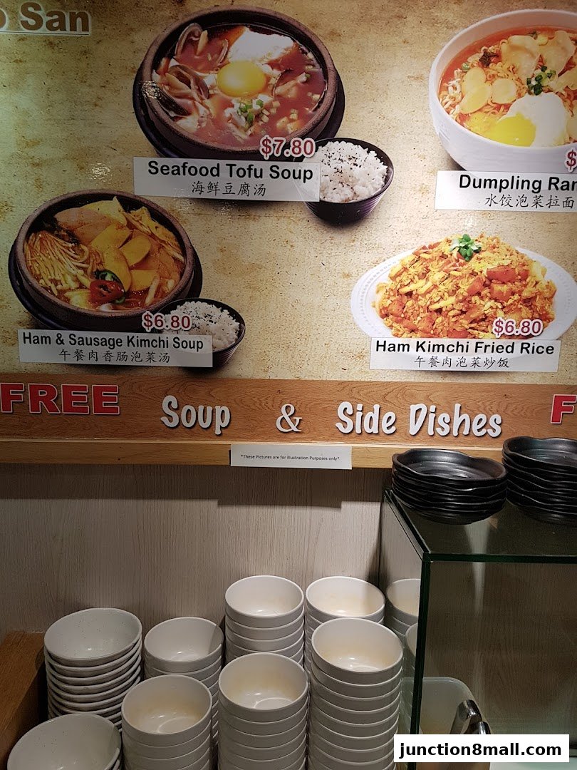 A menu display featuring Korean dishes like Seafood Tofu Soup and Ham Kimchi Fried Rice.
