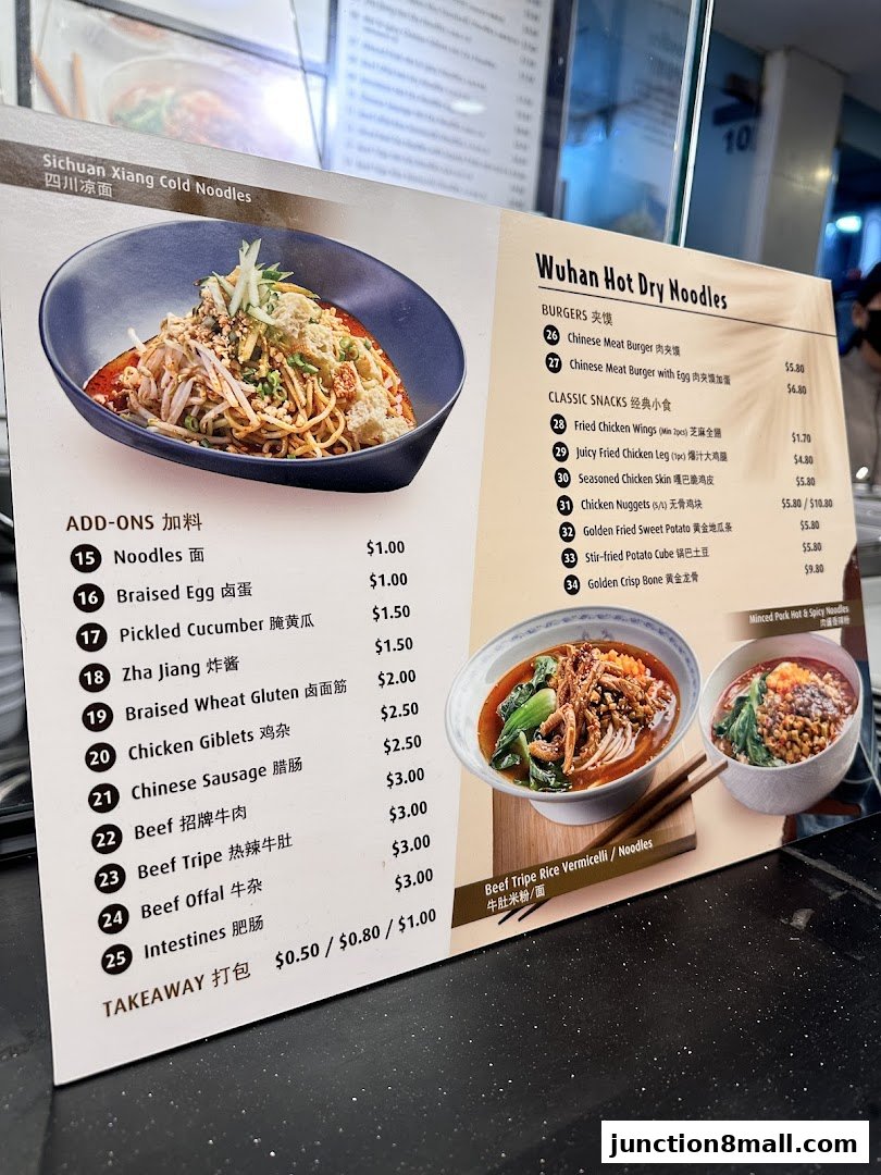A menu featuring Sichuan Xiang Cold Noodles and Wuhan Hot Dry Noodles with various add-ons.