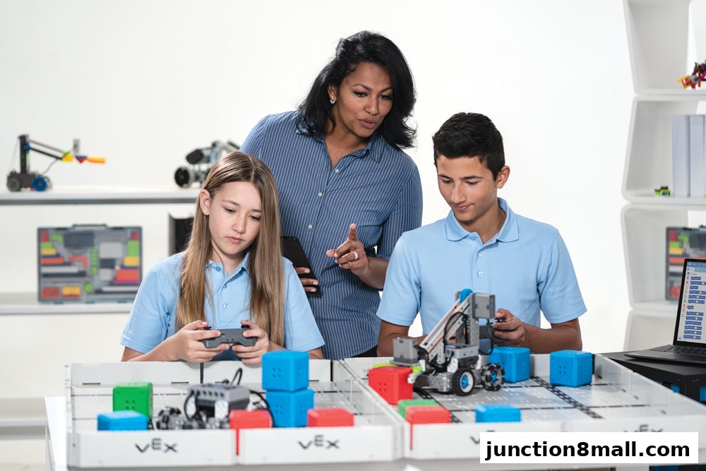 Students learning robotics with a teacher guiding them.