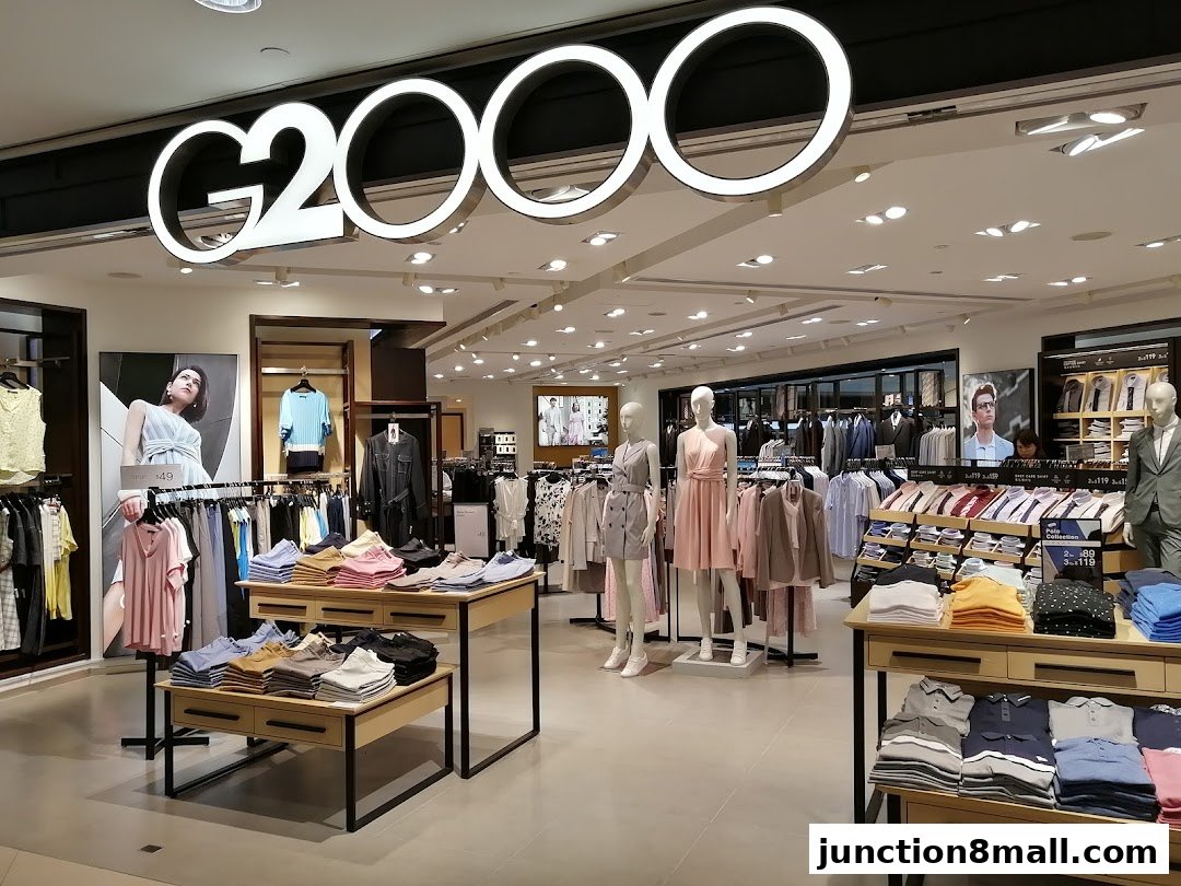 Interior view of a G2000 clothing store showcasing men's and women's apparel.