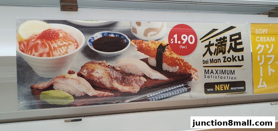 A display of various sushi dishes, including salmon, shrimp tempura, and other assorted nigiri.
