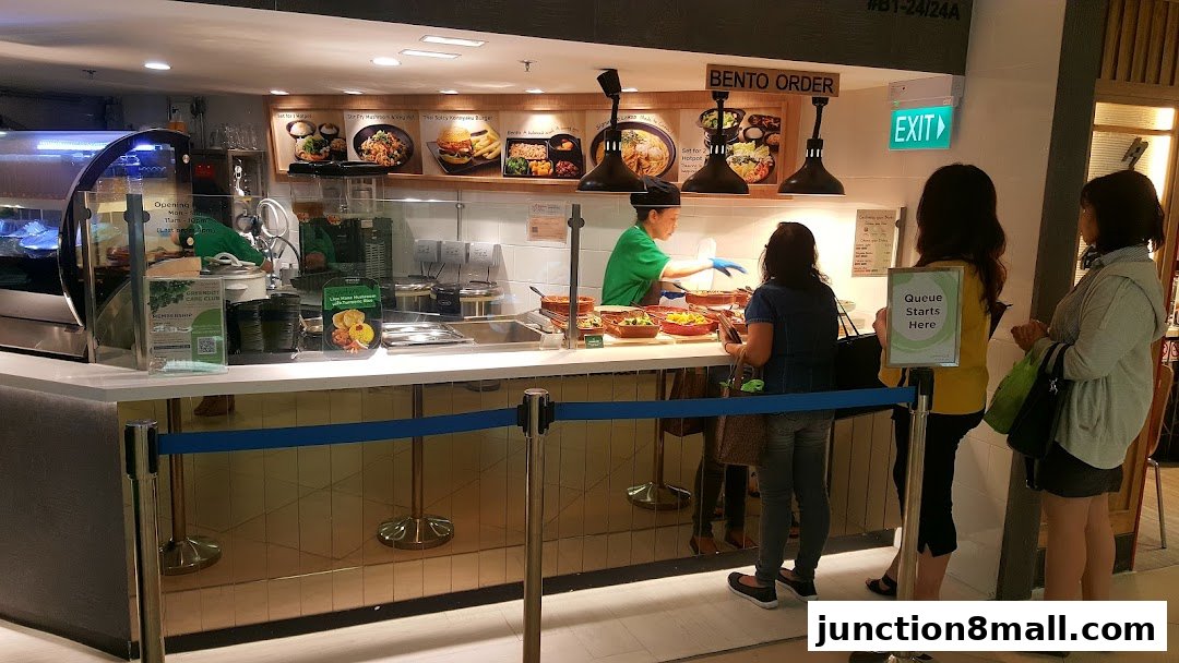 Customers queue at Greendot Junction 8 for bento orders and food.