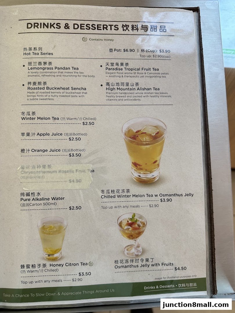 A menu featuring various teas, juices, and desserts with prices and descriptions.
