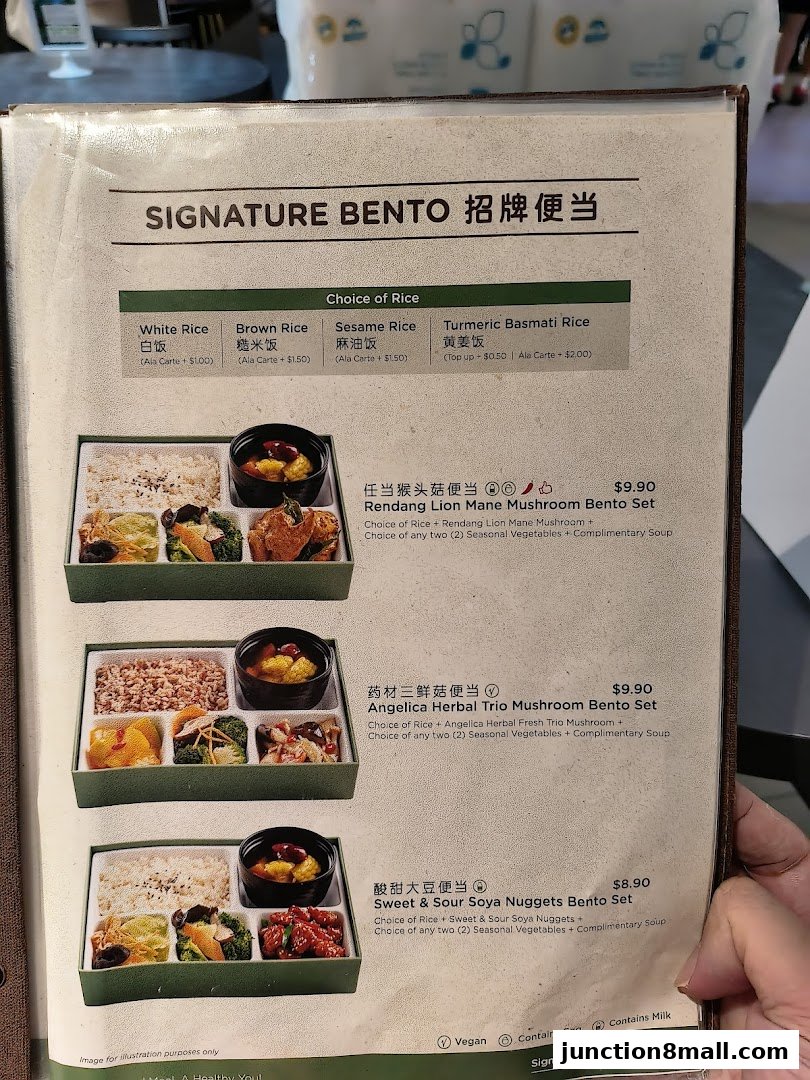 A menu showcasing signature bento sets with various rice and main dish options.