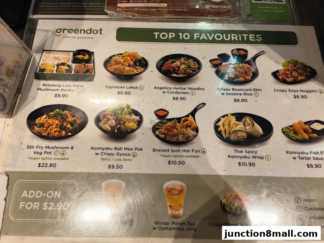 A menu from Greendot featuring their top 10 favorite dishes with prices and images.