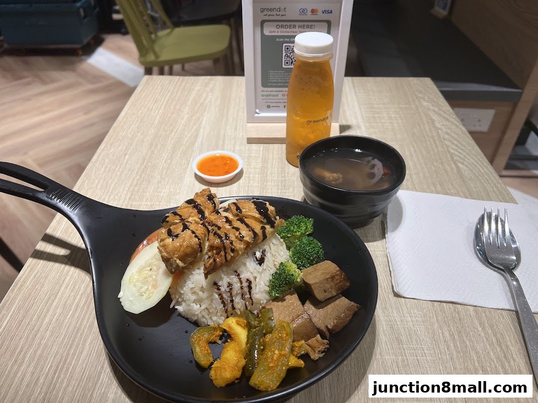 A delicious meal from Greendot Junction 8 featuring rice, protein, vegetables, soup, and a drink.