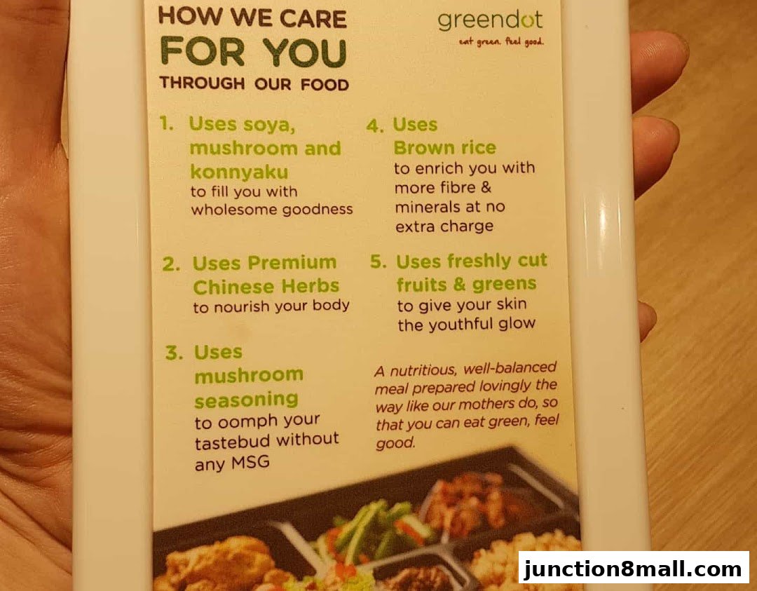 A close-up of a Greendot food packaging detailing their commitment to healthy ingredients.