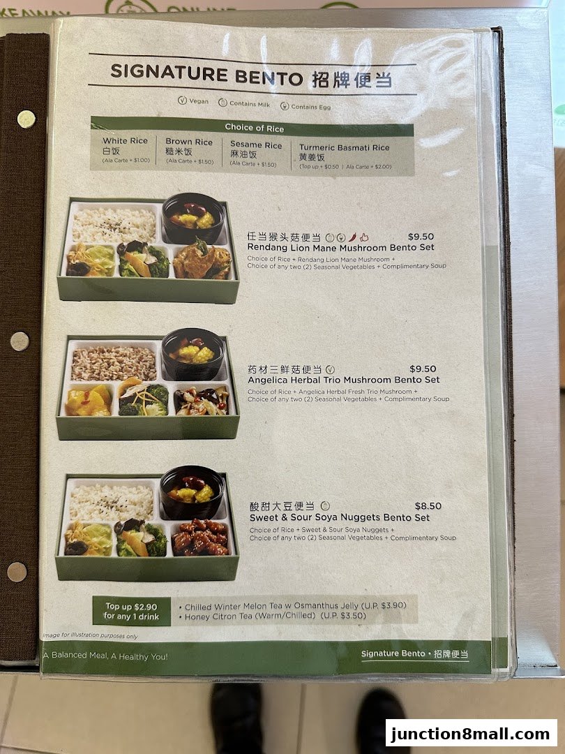 A menu featuring signature bento boxes with various rice choices and main dishes.