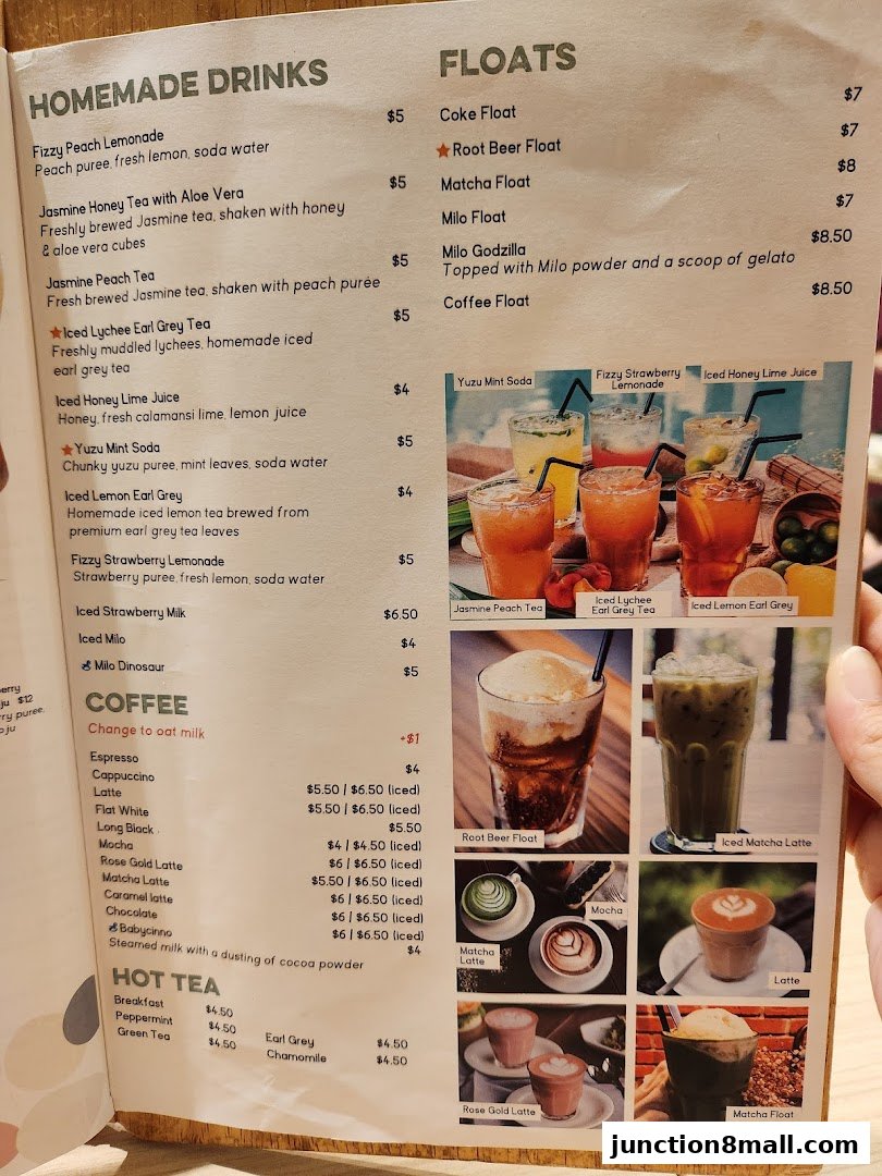 A menu from GRUB Junction 8 featuring homemade drinks, floats, coffee, and hot tea with accompanying images.