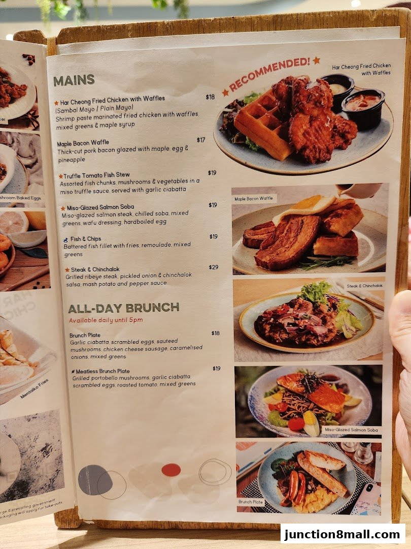 A menu from GRUB Junction 8 featuring mains and all-day brunch options with food photography.