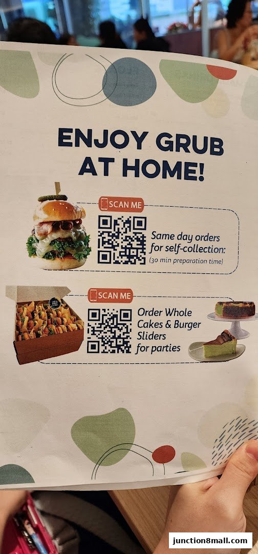 A flyer from GRUB Junction 8 promoting home dining with QR codes for ordering.