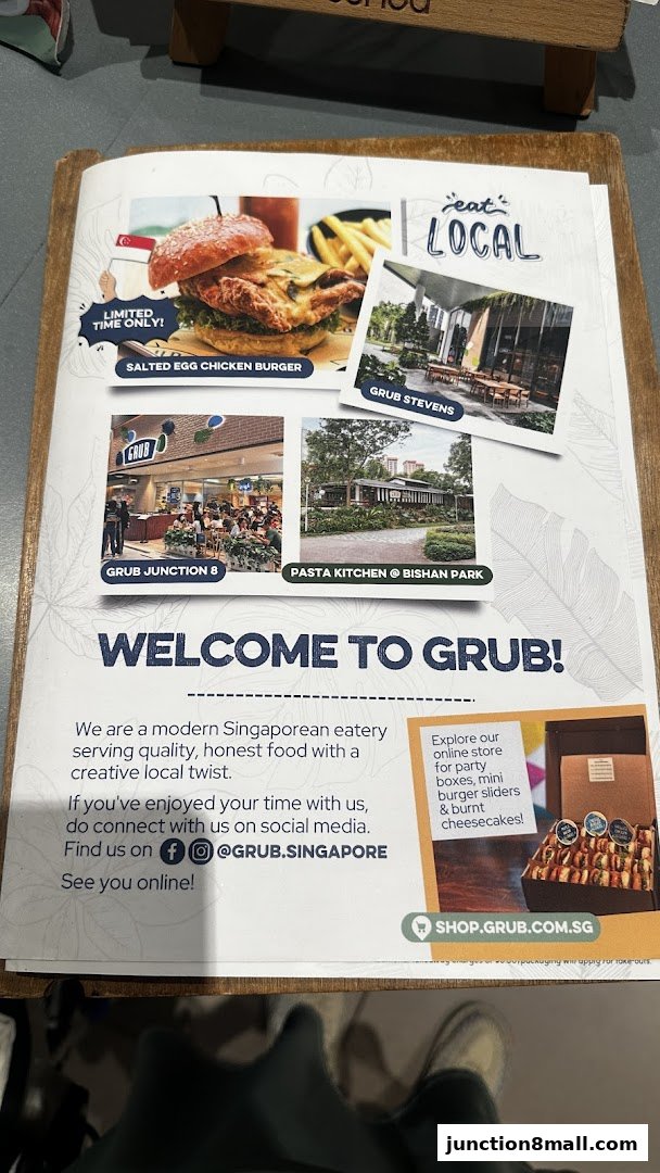 A flyer for GRUB Junction 8 showcasing their Salted Egg Chicken Burger and other locations.