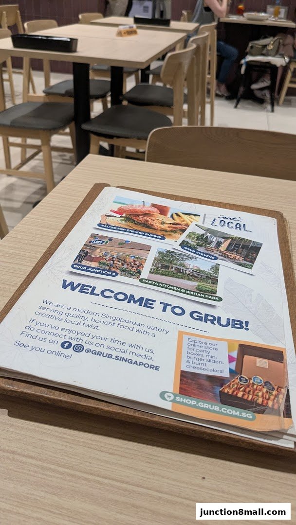 A menu from GRUB Junction 8 showcasing food and restaurant locations.