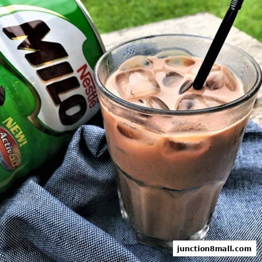A refreshing iced Milo drink with a can of Milo and a straw.