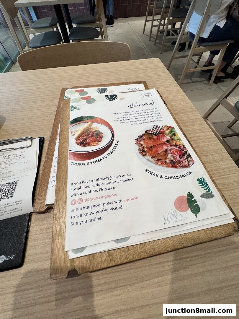 A menu from GRUB Junction 8 featuring Truffle Tomato Fish Stew and Steak & Chinchalok.