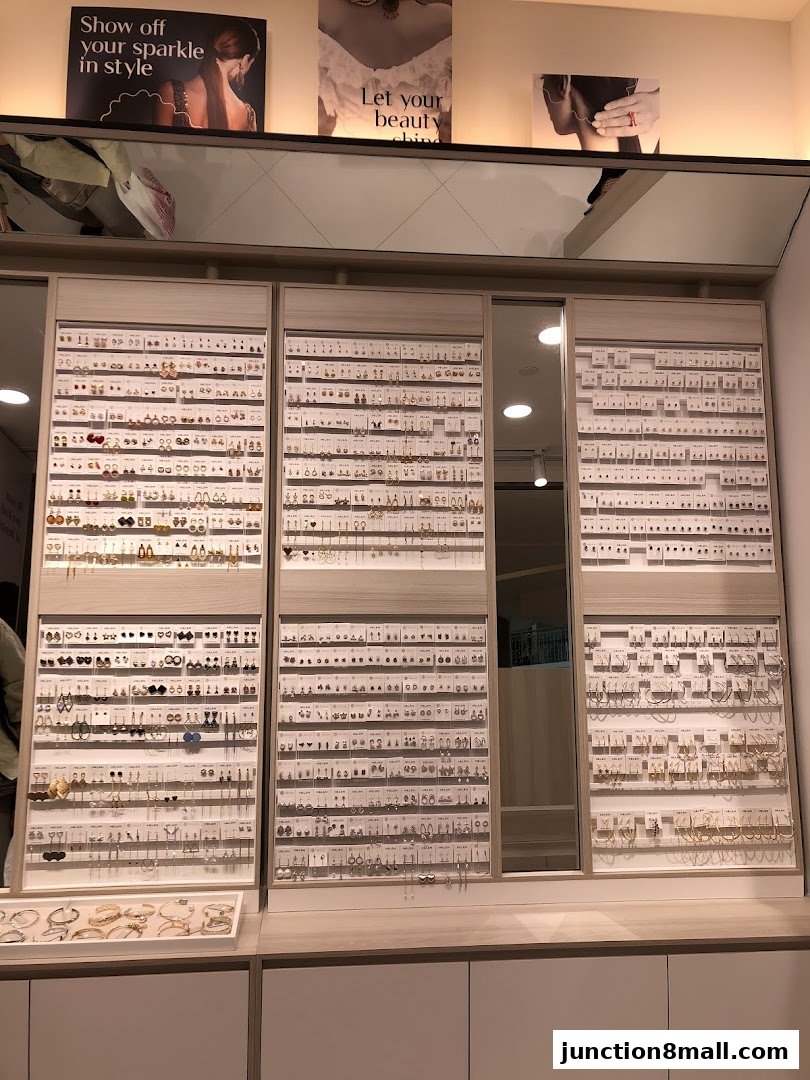 A display of various earrings and jewelry at Helen store.