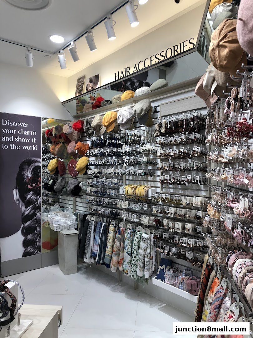 A shop interior displaying a wide variety of hair accessories and hats.
