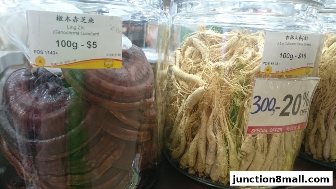 Jars of Ling Zhi (Reishi mushrooms) and Ji Lin Cultivated Panax Ginseng are displayed with price tags and a special offer.