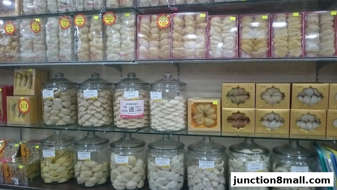 Shelves stocked with various bird's nest products and dried herbs in jars and boxes.