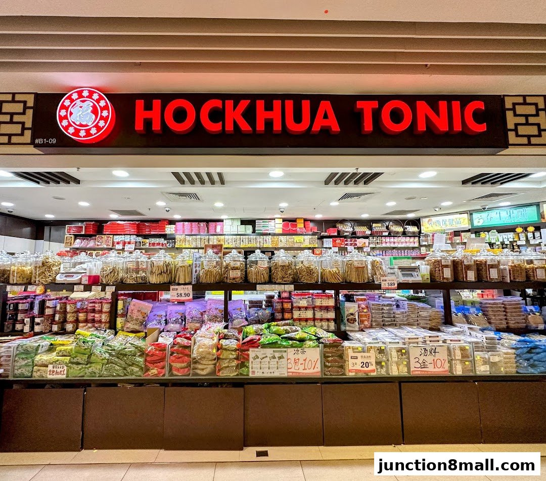 The Hockhua Tonic shop front displays a wide variety of health products and tonics on shelves.