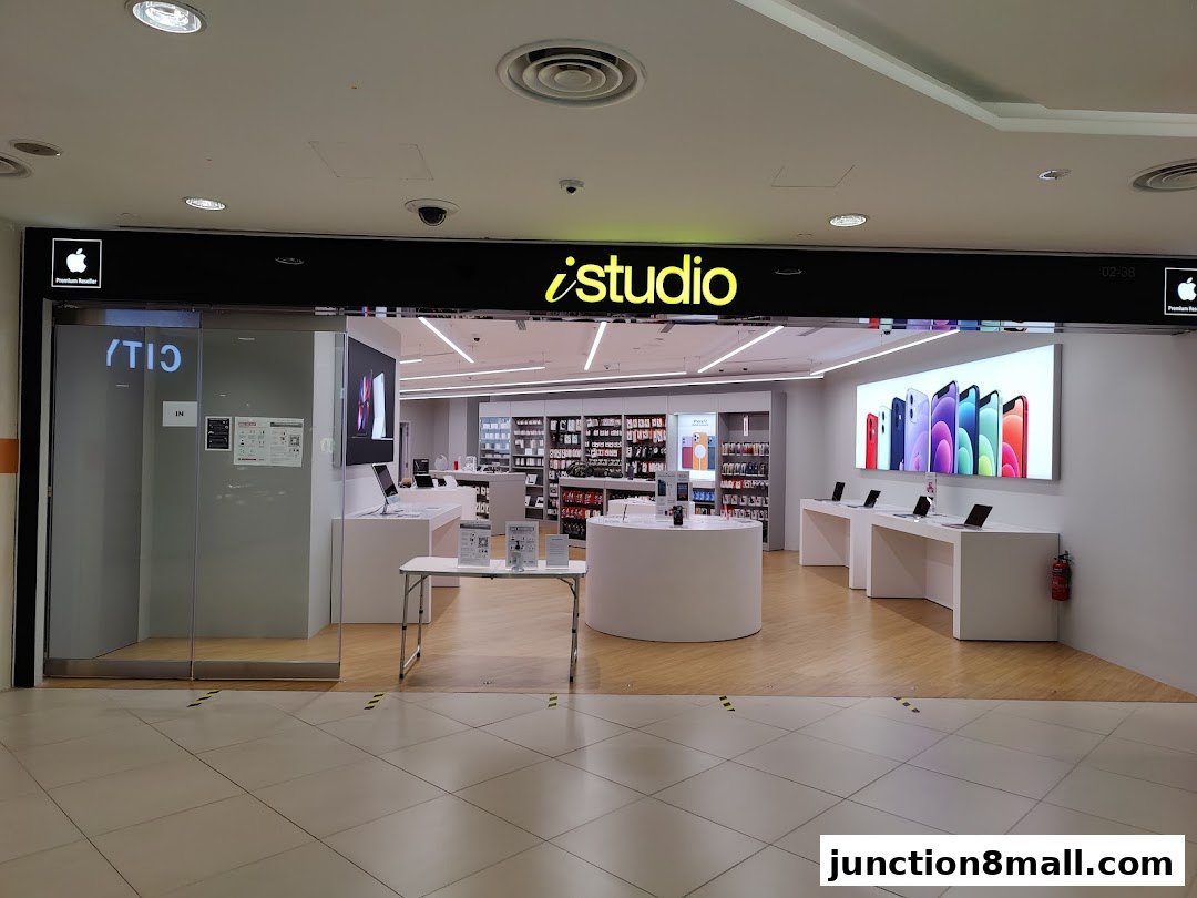 The entrance to an iStudio Apple Premium Reseller store showcasing iPhones.
