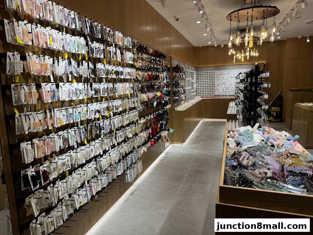 A well-lit shop interior showcasing a vast collection of hair accessories displayed on walls and in bins.