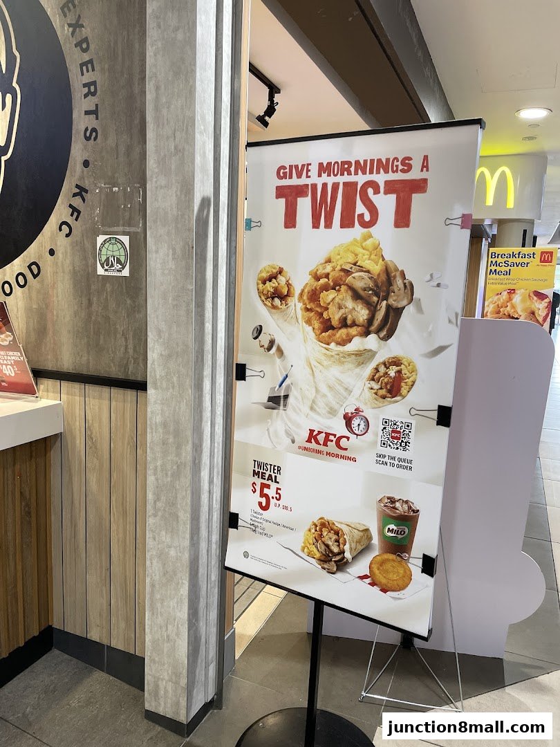 A promotional banner for KFC's Twister Meal, featuring fried chicken and breakfast items.