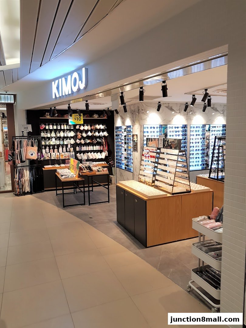 The KIMOJ store displays a wide selection of sunglasses and accessories.