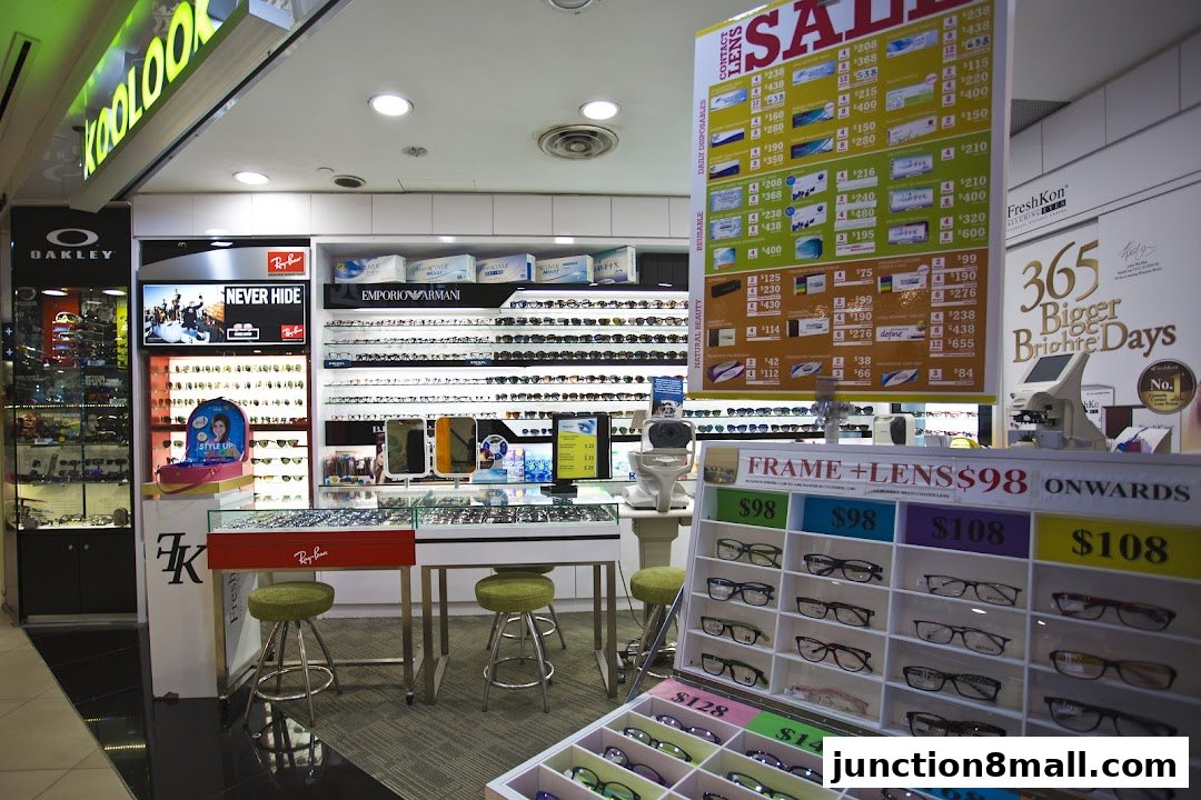 A Koolook optical shop displaying various eyewear brands and contact lens promotions.