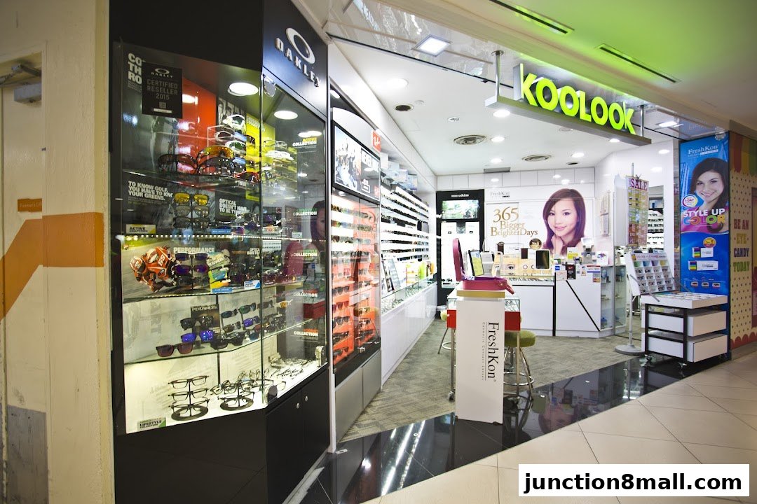 Interior view of Koolook, an eyewear store, showcasing various sunglasses and optical frames.