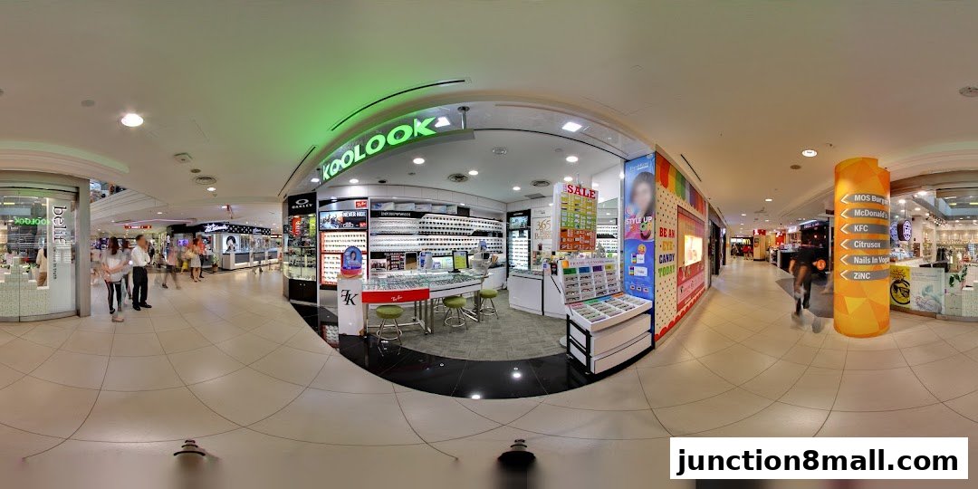 The Koolook optical shop displays a wide selection of eyeglasses and sunglasses in a mall setting.