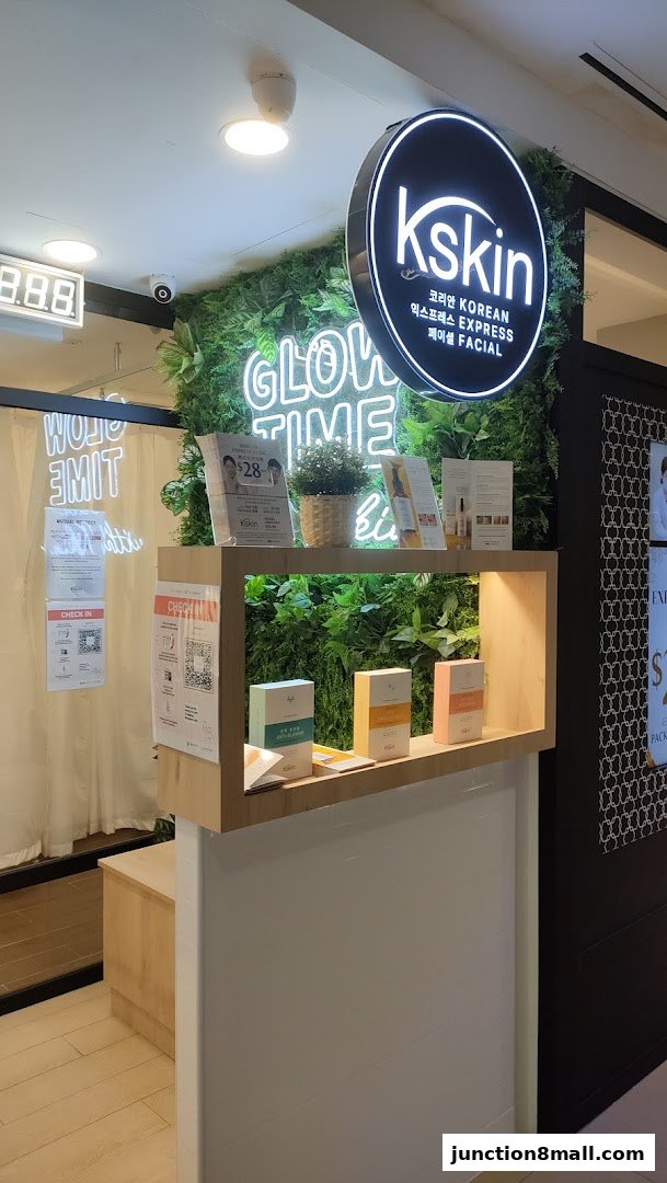 Kskin Korean Express Facial shop front with neon signs and product display.