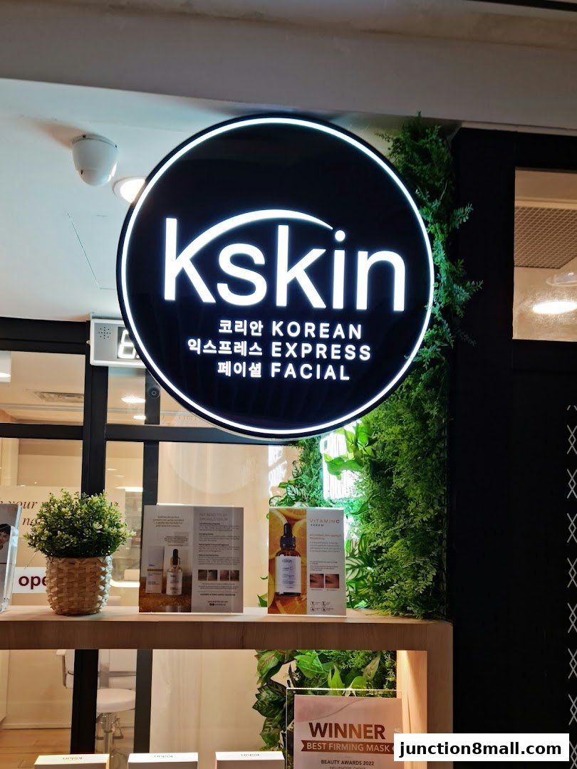 The Kskin Korean Express Facial shop front with its illuminated sign and product displays.