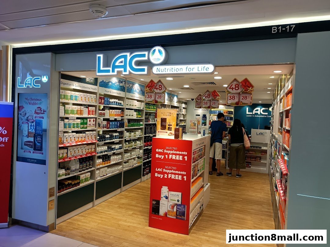 The entrance of LAC Nutrition For Life shop, showcasing shelves stocked with health supplements and promotional displays.