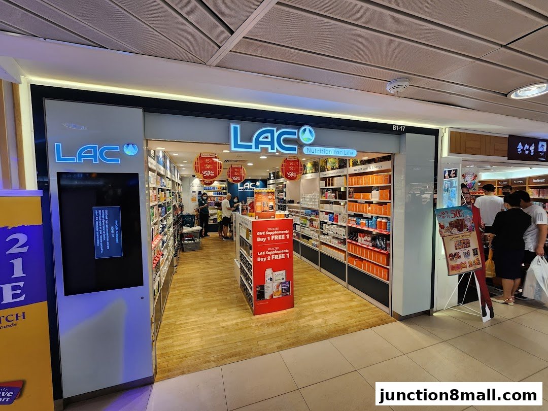 The entrance of LAC Nutrition For Life store, showcasing shelves stocked with health supplements and promotional displays.