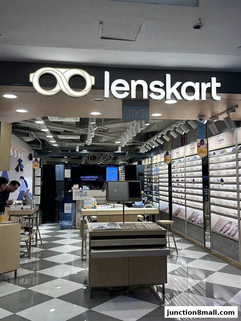 The Lenskart store entrance with a display of eyeglasses and a checkered floor.