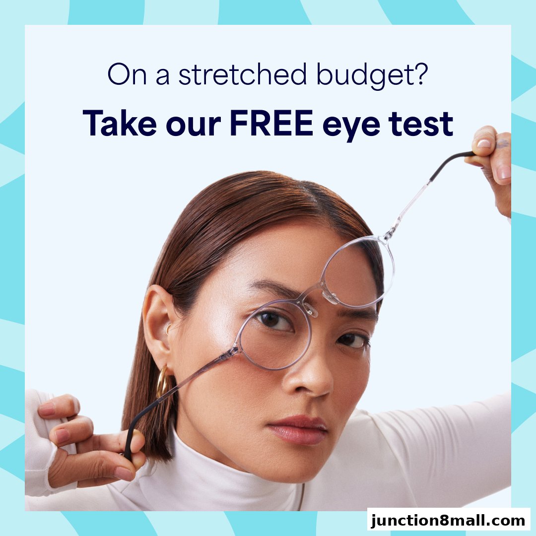 A woman holds up a pair of glasses, with text promoting a free eye test.