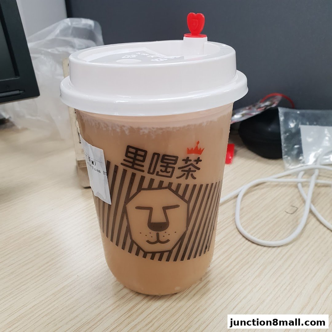 A cup of LiHO TEA with its signature lion logo and branding.