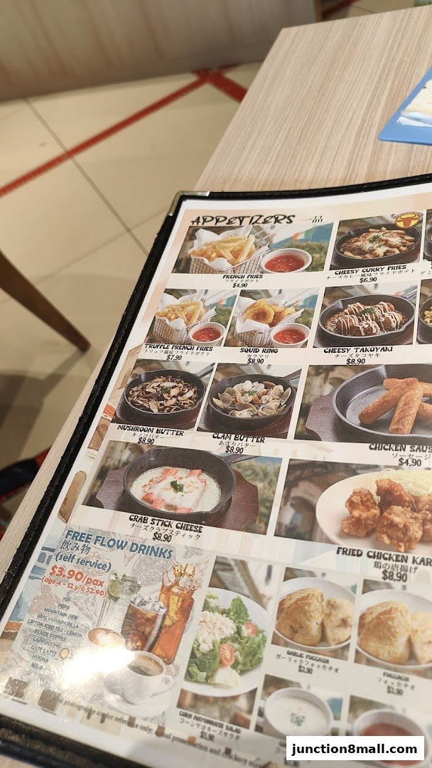 A menu from Milan Shokudo Junction 8 featuring appetizers and drinks.