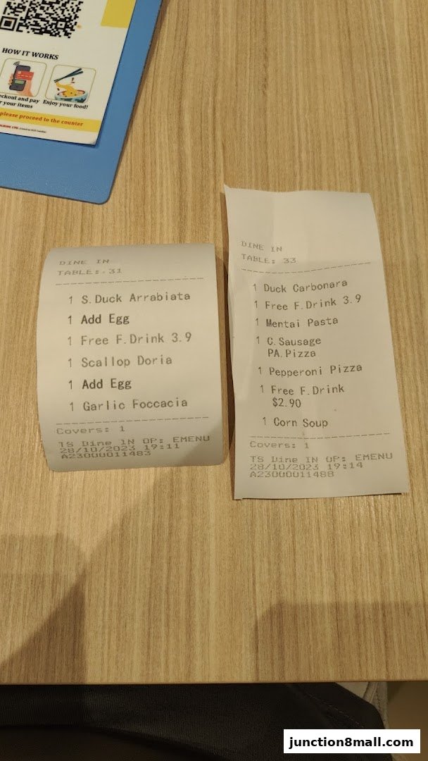 Two receipts showing food orders from Milan Shokudo Junction 8.