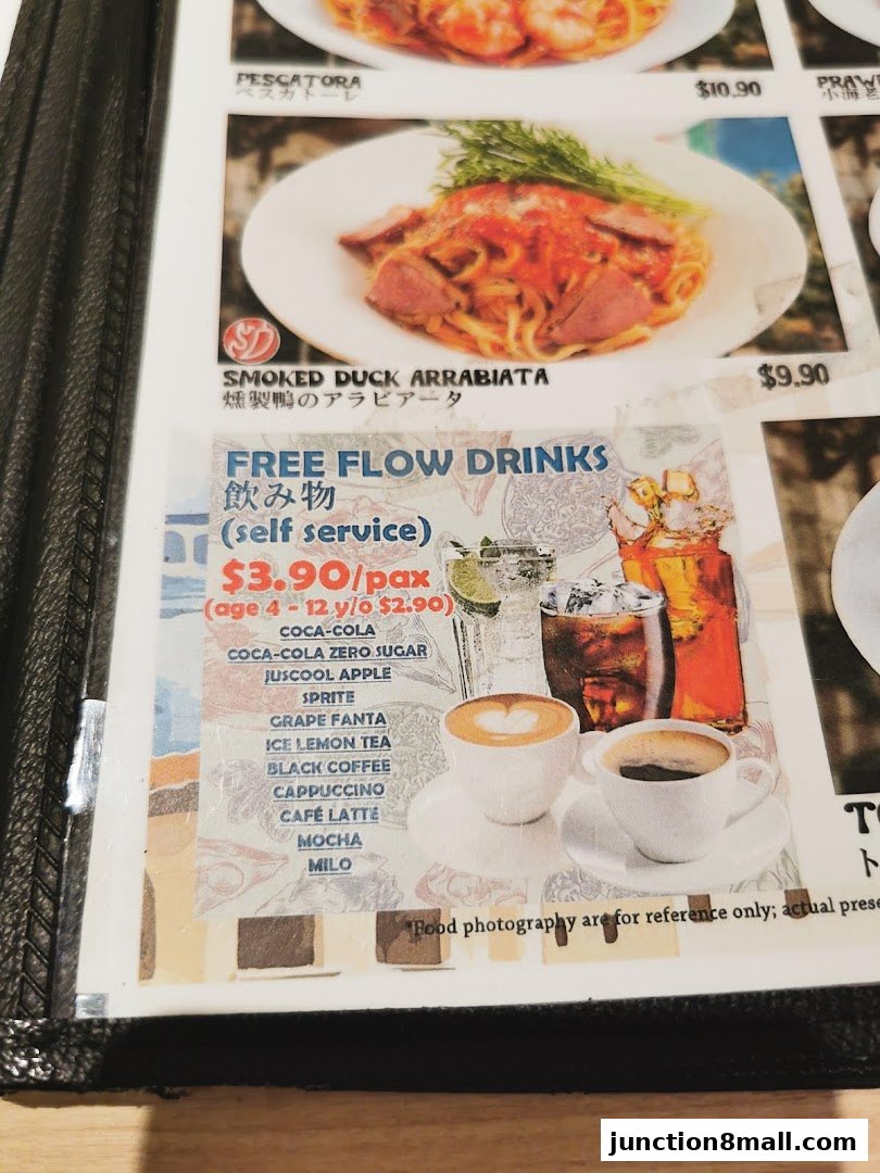 A menu page featuring pasta dishes and a free flow drinks offer.