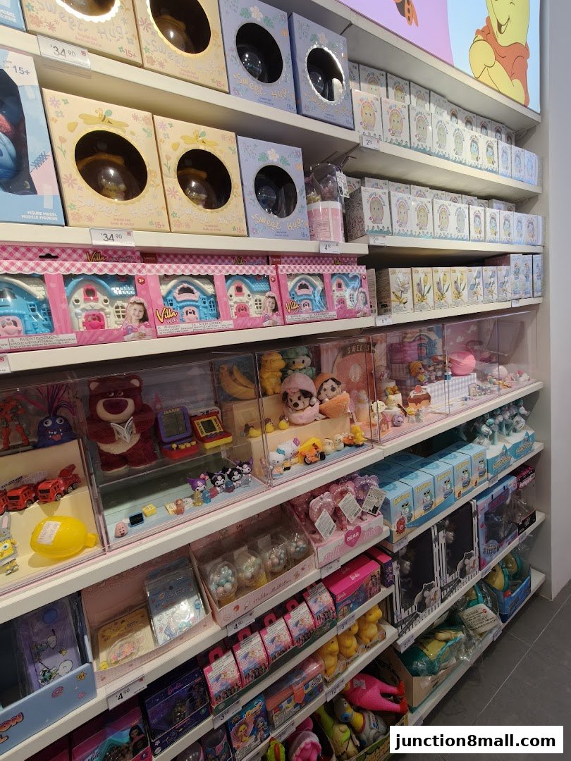 Shelves filled with various toys and merchandise, including dolls, plushies, and collectible items.