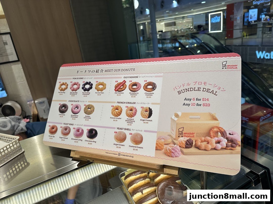 A menu board showcasing various donuts and bundle deals from Mister Donut.