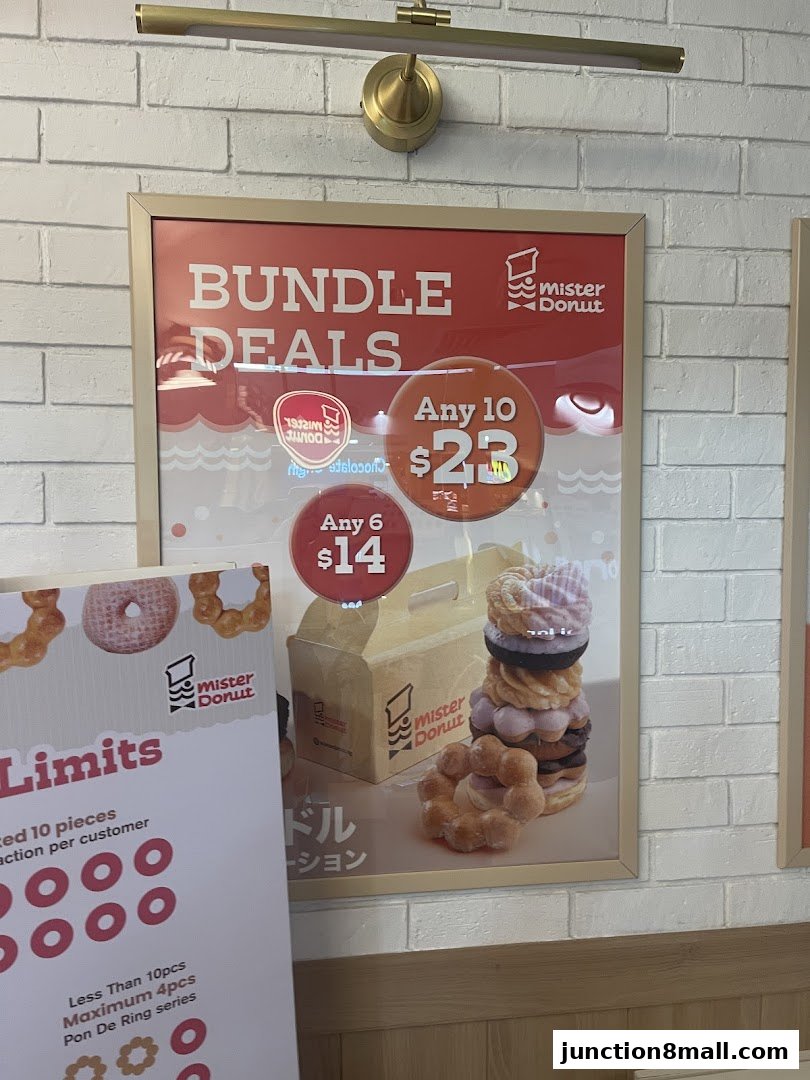 A poster advertising Mister Donut's bundle deals with prices for 6 and 10 donuts.