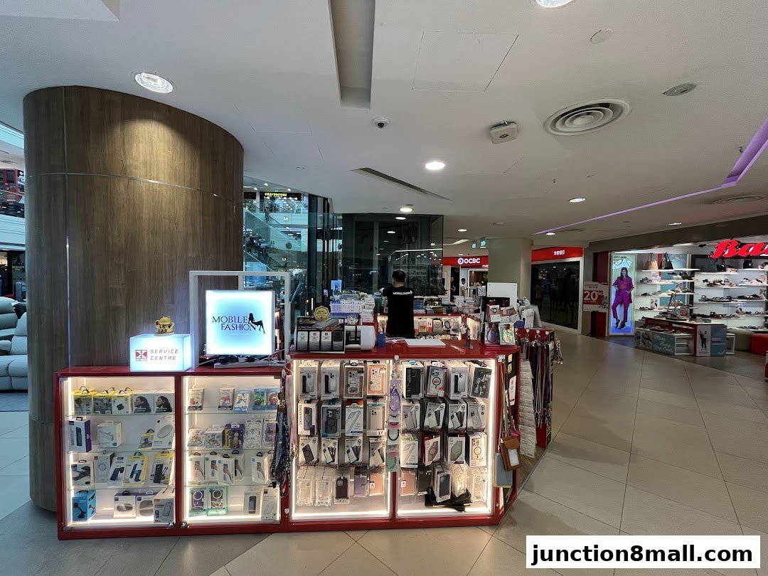 A mobile fashion store displaying various phone accessories and cases.